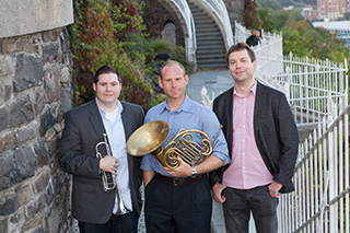  NYC-based Universal Brass Ensemble: Thomas Boulton (trumpet), Dan Wions (French horn), and Yevgeny Morozov (piano). 
